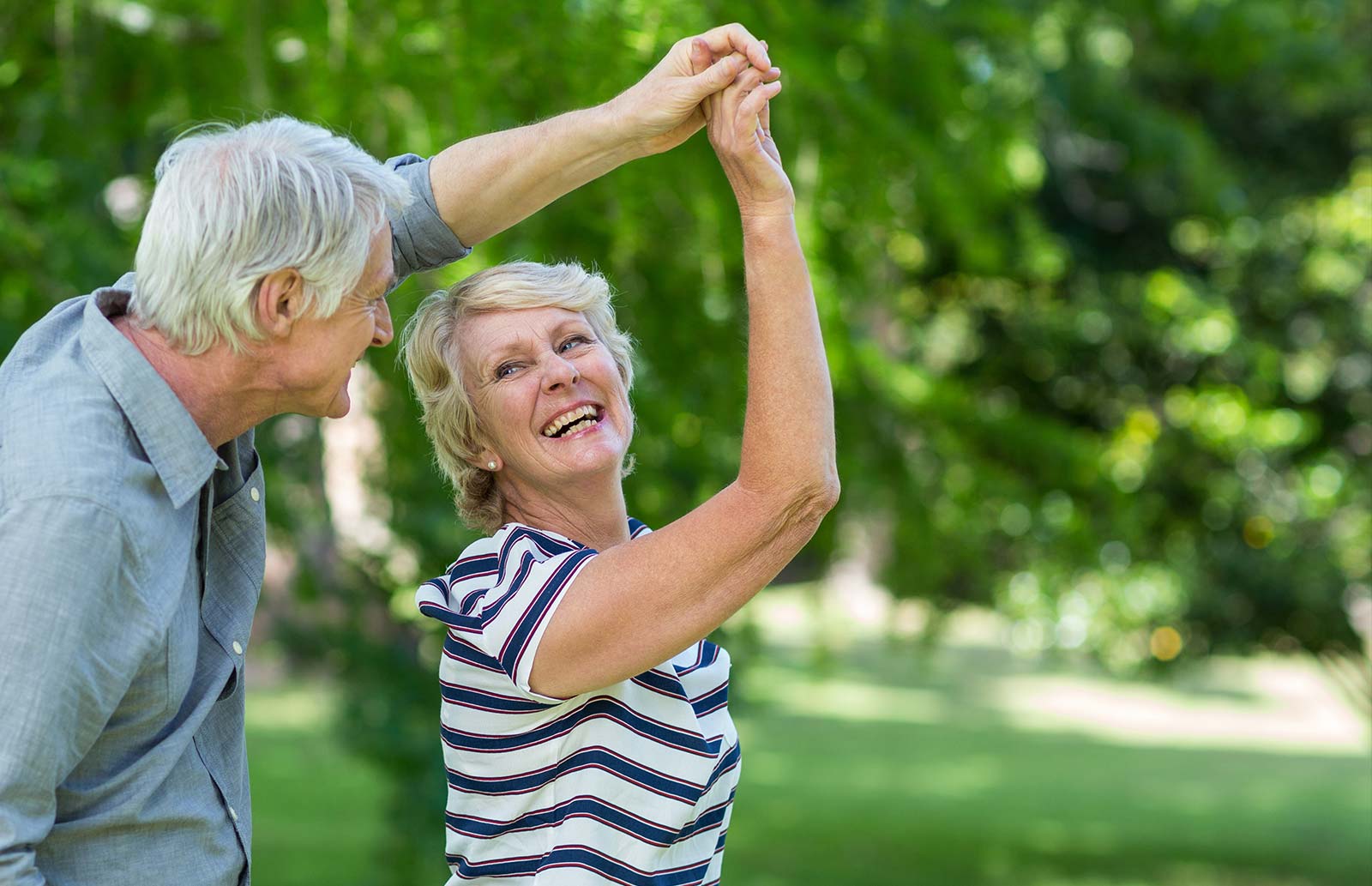 elderly couple dancing