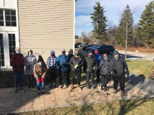 group of adults ready for an outdoor hike