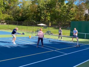 couples playing pickle ball