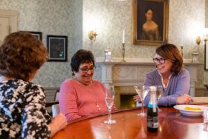women enjoying a drink at Fuller Village