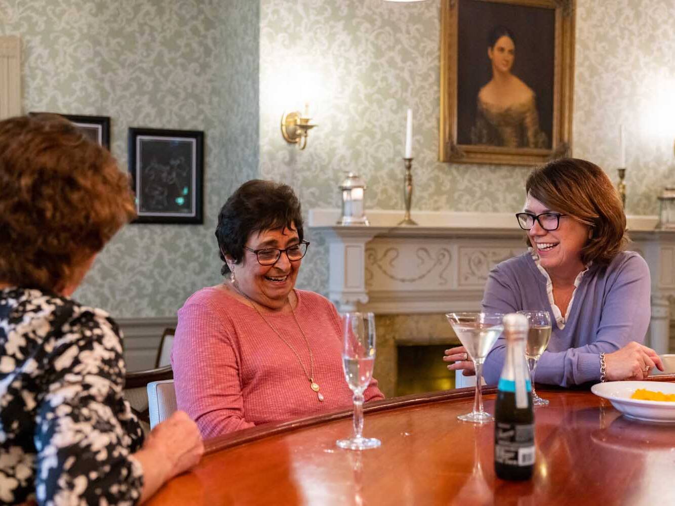 women enjoying a drink at Fuller Village