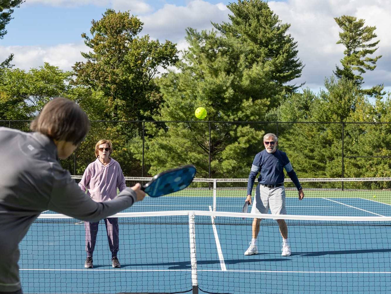 seniors playing pickle ball