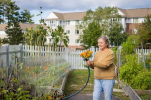 woman watering garden