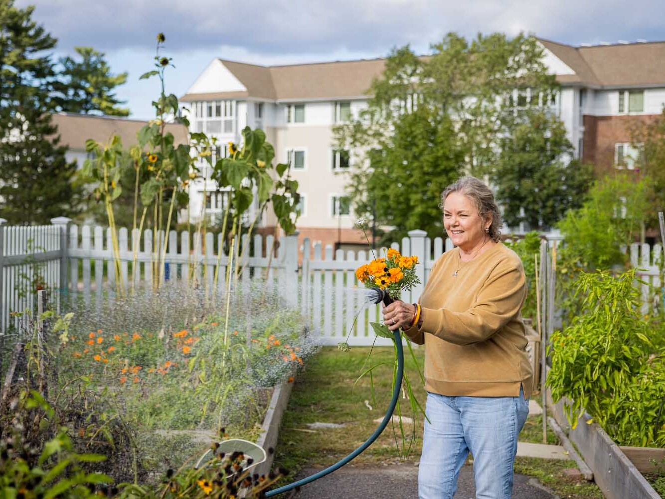 woman watering garden